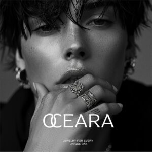 Editorial-style promotional design for OCEARA featuring a close-up model with multiple jewelry pieces, used in print and digital campaigns. Designed byannas.com.